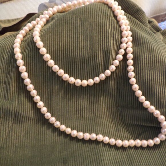 Faux Pearls - Necklace is 24” Length Color: Ivory - Picture 2 of 5